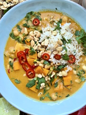 Butternut squash panang curry with chickpeas and coconut milk in a bowl