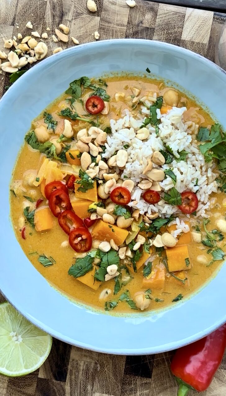 Butternut squash panang curry with chickpeas and coconut milk in a bowl