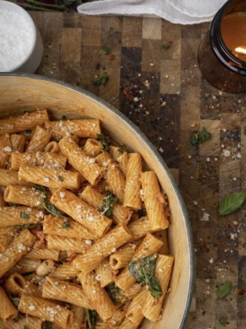Creamy Marry Me pasta with sun-dried tomatoes, white beans, and spinach in a cashew cream sauce