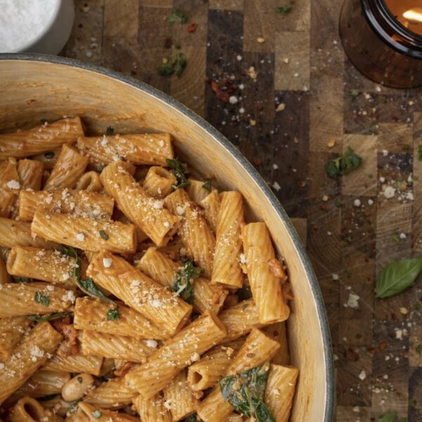 Creamy Marry Me pasta with sun-dried tomatoes, white beans, and spinach in a cashew cream sauce