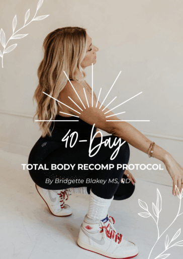 Woman in black workout set squatting in a minimalist space, representing a 40-day total body recomposition program focused on strength, muscle building, and confidence, by a registered dietitian.